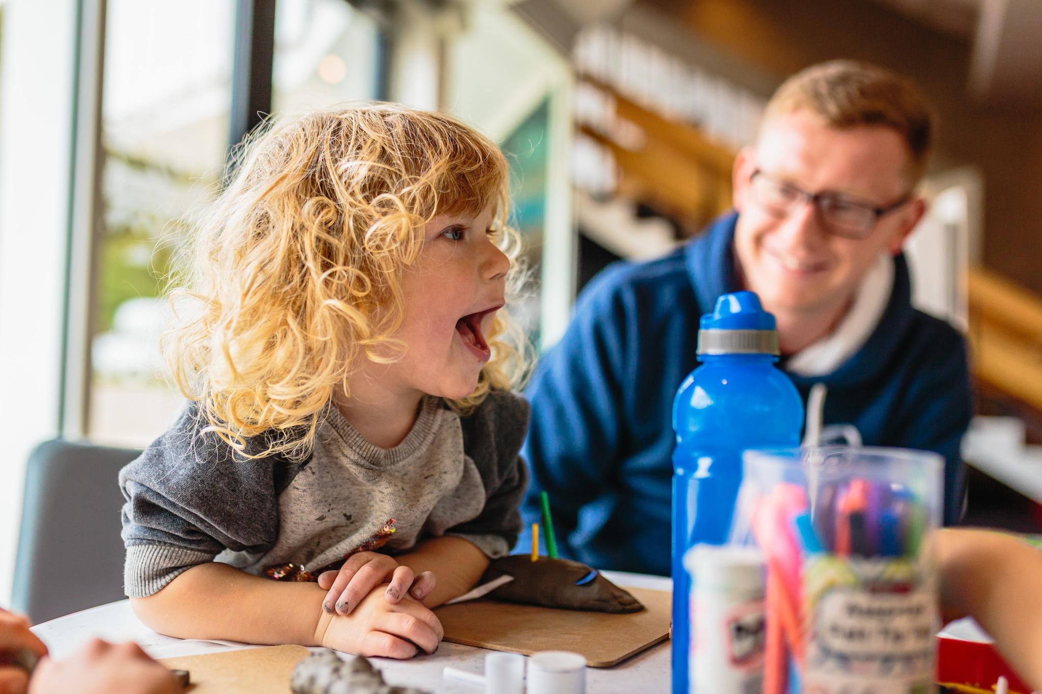 A parent plays with their child at Chichester Festival Theatre.