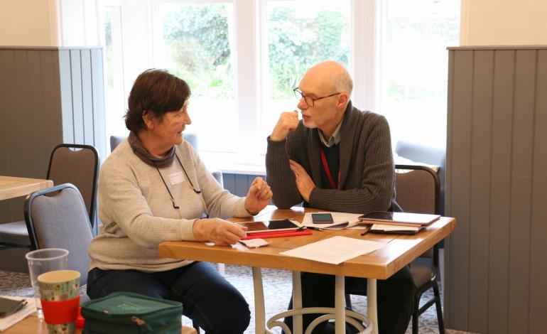 Hometech volunteer assisting 